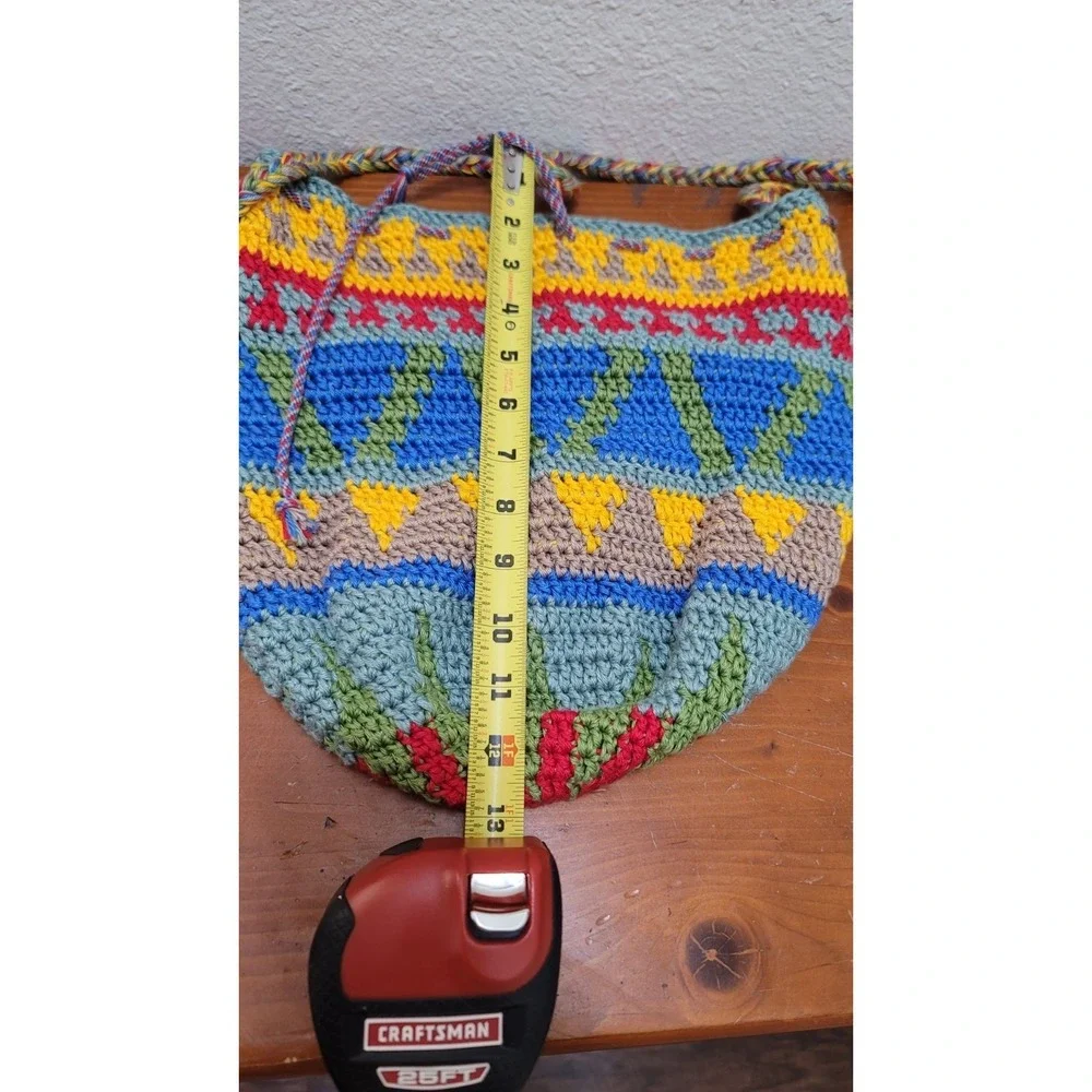 Handcrafted Colorful Crochet Sling Bag With Drawstring Closure For Boho-Chic Sty